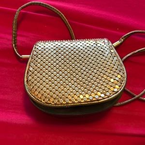 Women’s gold snap front Crossbody